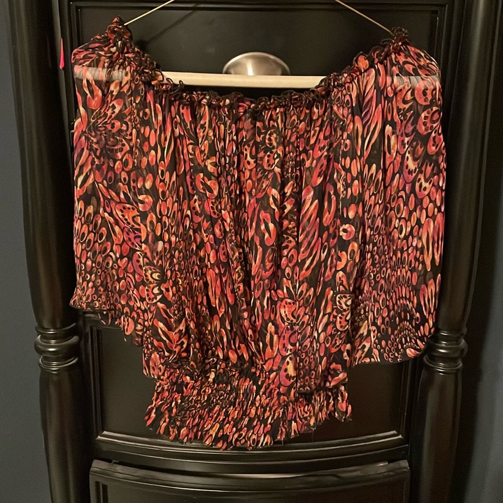 See through shirt - bottom is elastic type material. Comfortable